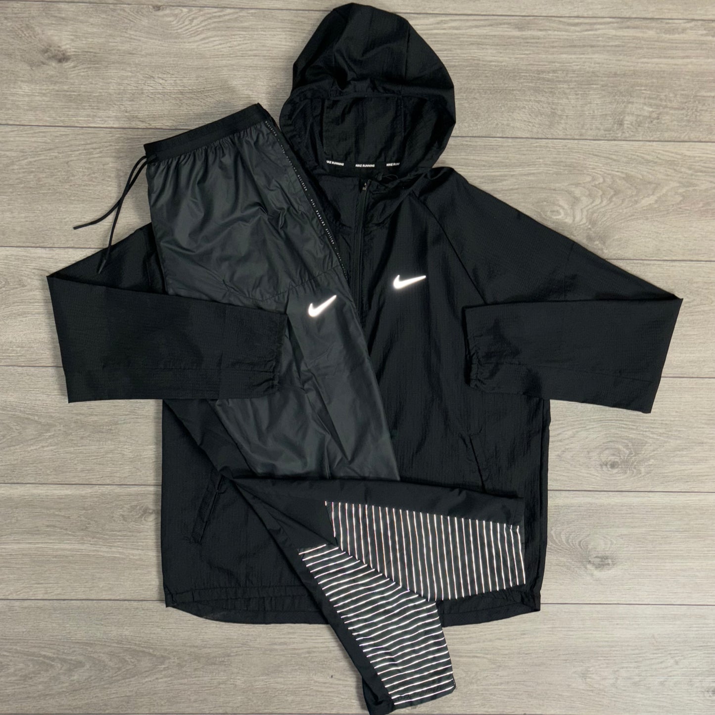 Nike Repel Windrunner Black / Run-Division Phenom Elite Flash Pants